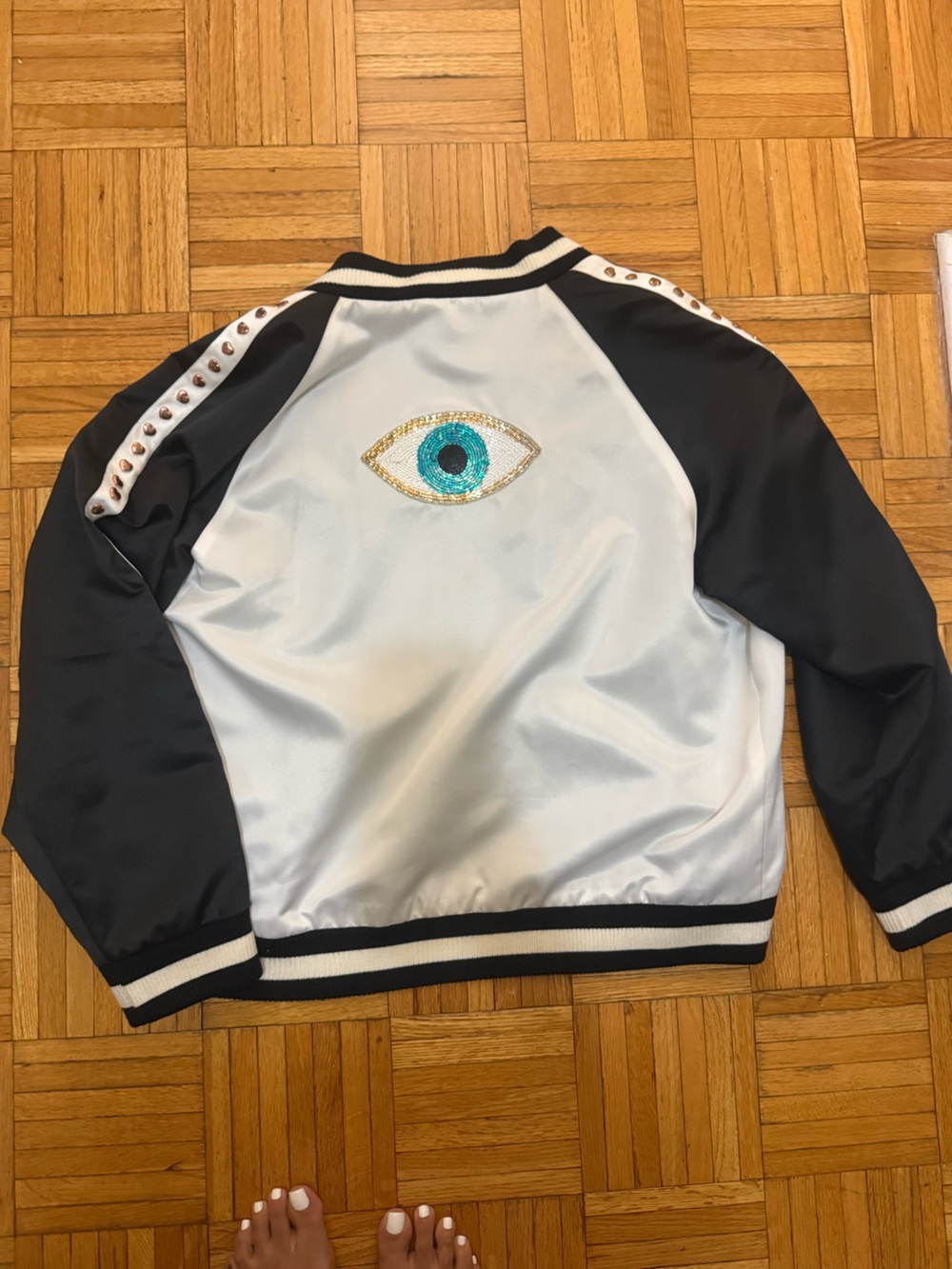 JOCELYN White and Black Satin Bomber Jacket with EVIL EYE EMBELLISHMENT